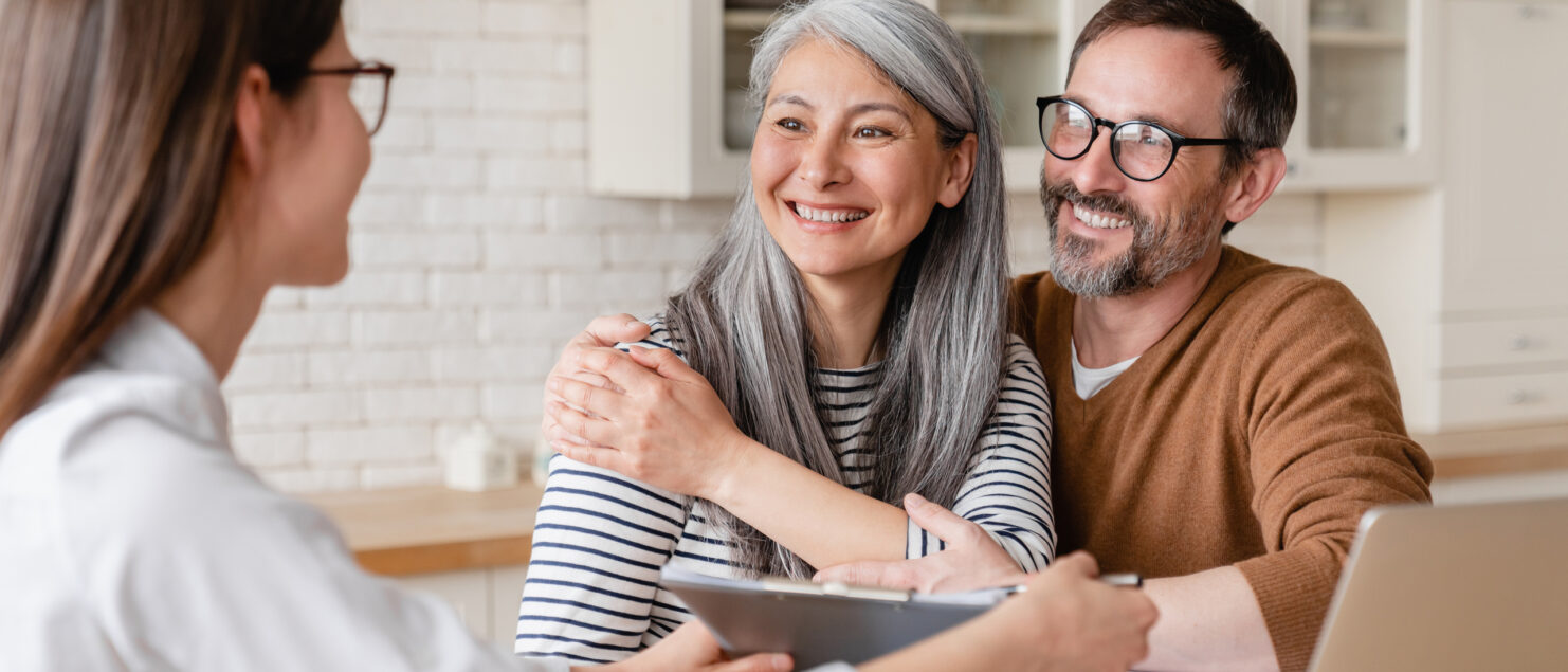 A couple meeting with a financial planner.